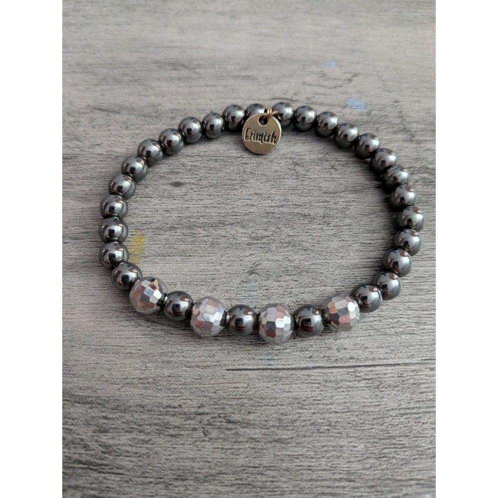 Erimish Gunmetal Grey Metallic Beaded Stretch Bracelet with Logo Charm